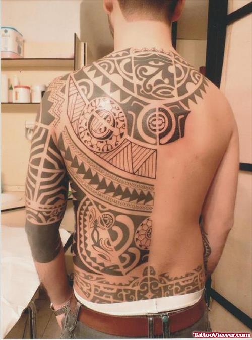 Black Ink Maori Back Tattoo For Men