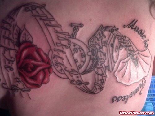 Red Rose Clock And Music Back Tattoo