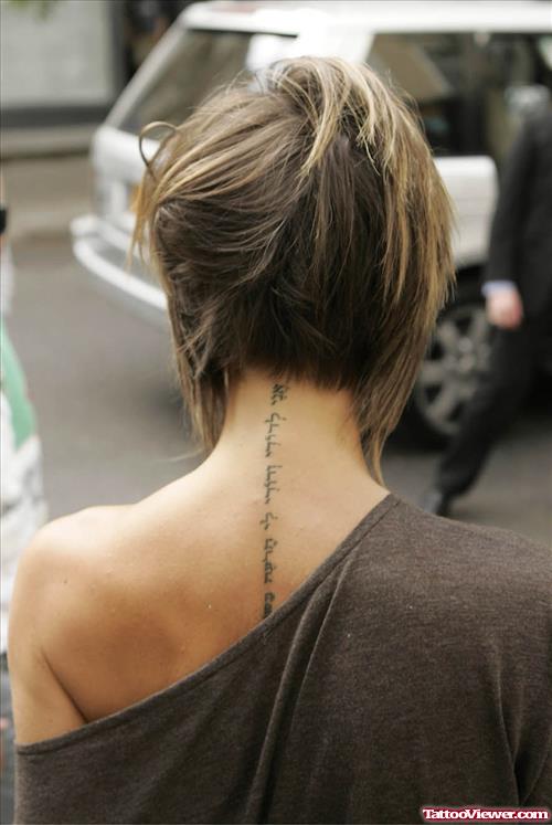 Victoria Becham With Hebrew Tattoo On Back