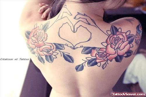 Rose Dlowers And Hand Heart Tattoo On Back