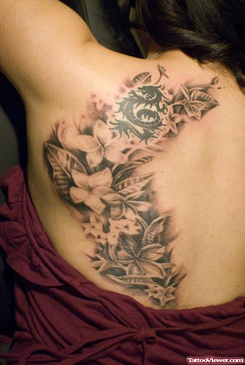 Grey Ink Flowers And Black Ink Dragon Tattoo On Back
