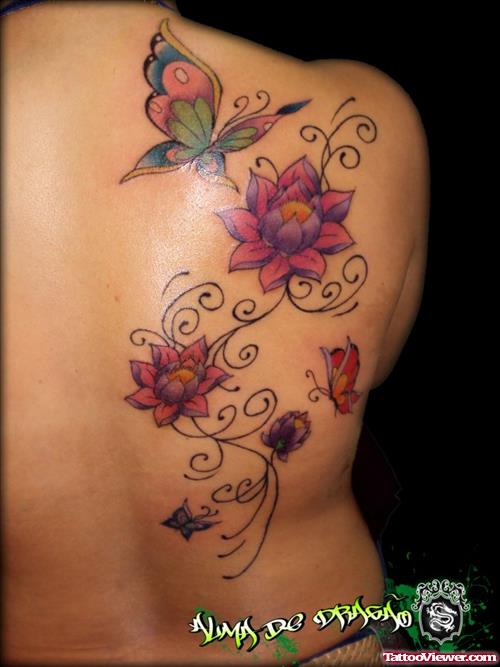 Awesome Colored Butterfly And Flowers Back Tattoo