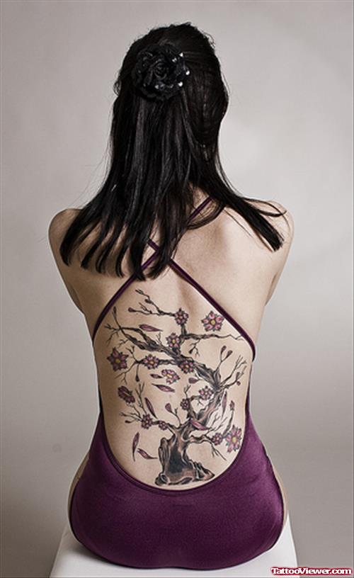 Girl With Tree Tattoo On Back