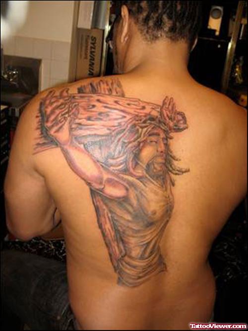 Jesus On Cross Grey Ink Tattoo On Back