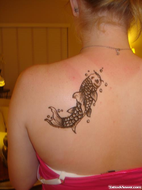 Grey Ink Fish Back Tattoo For Girls