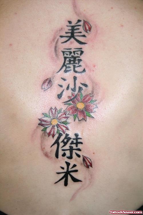 Kanji Symbols And Red Flowers Tattoo