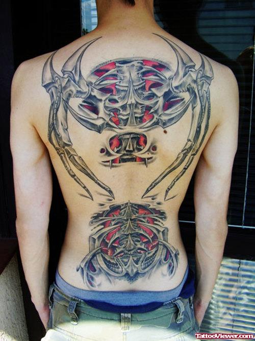 Attractive Biomechanical Tribal Back Tattoo