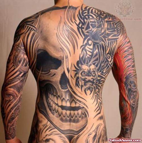 Tribal And Skull Tattoo On Back