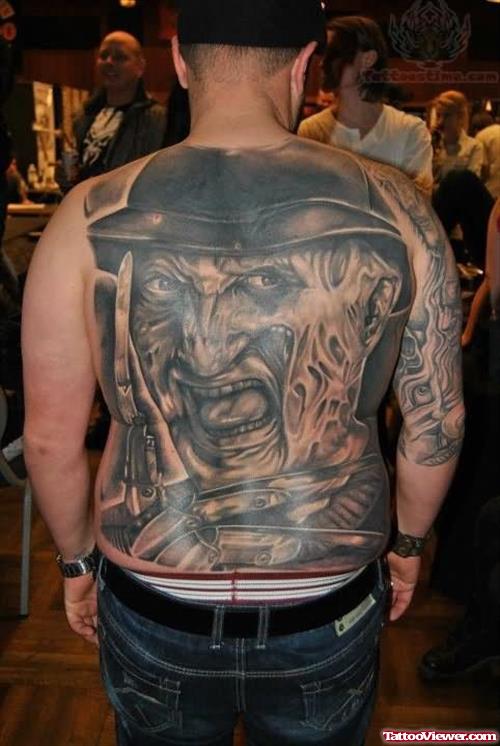 Flaming Face Tattoo On Back