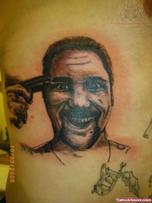 Men Shooting Himself Tattoo On Back