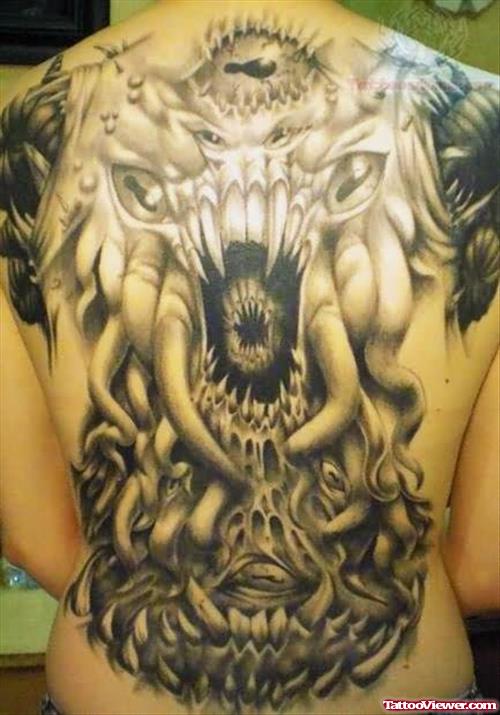 Grey Ink Scary Back Tattoo