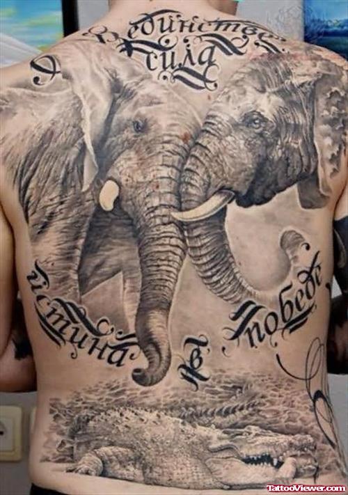 Elephant And Crocodile Tattoo On Back