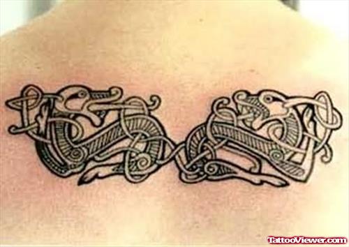 Lovely Celtic Tattoo Design On Back