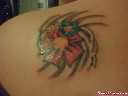 Fine Flower Tattoo On Back