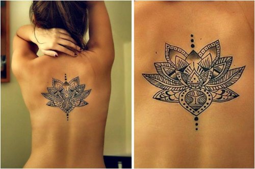 Girl With Grey Ink Flower Back Tattoo