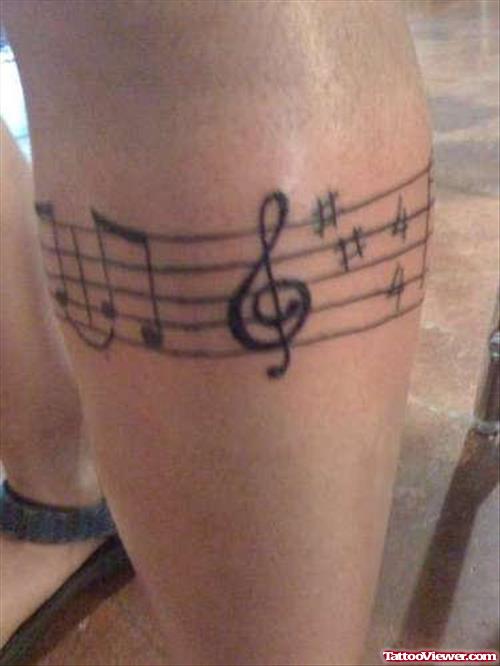 Muscial Band Tattoo On Leg