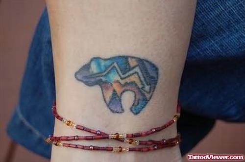 Imaginative Bear Tattoo On Wrist