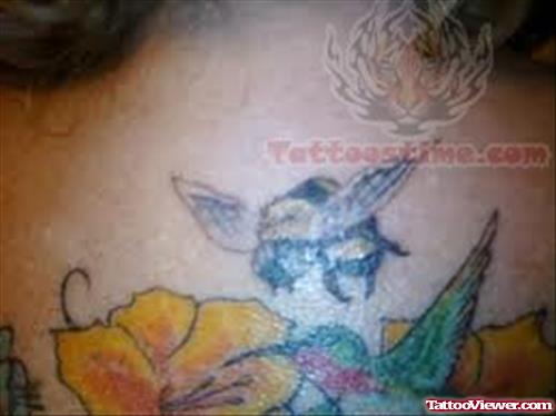 Flowers And Bee Tattoo On Back