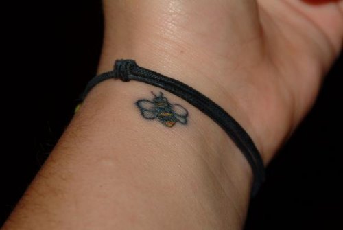 Tiny Bee Tattoo On Left Wrist