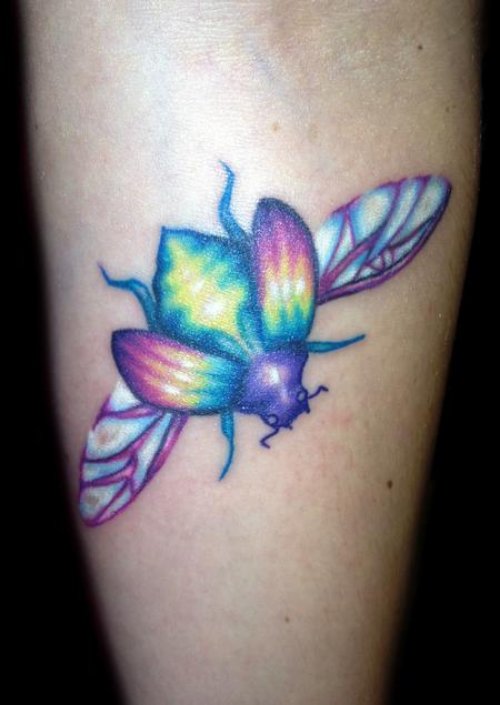 Awesome Colored Beetle Tattoo On Sleeve