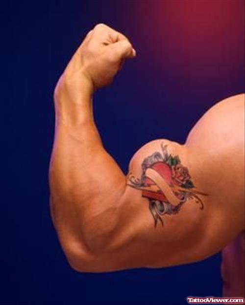 Red Heart Tattoo On Biceps