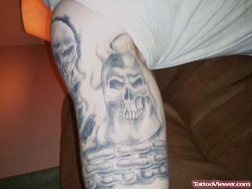 Ghost Inside Bicep Tattoo