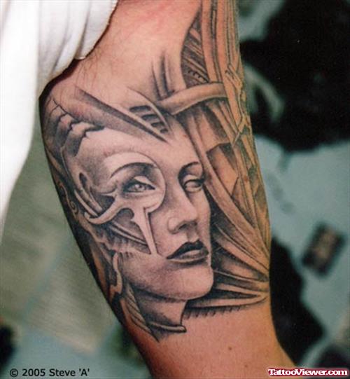 Face Tattoo On Biceps