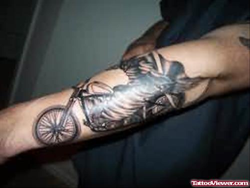 Bike Rider Tattoo On Arm