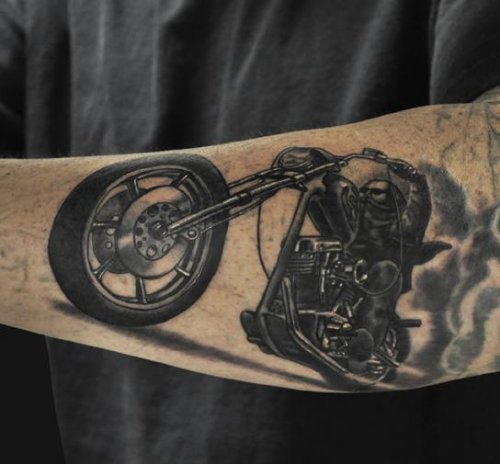 Black Ink Biker Tattoo On Man Left Arm