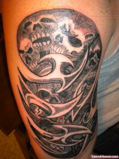 Grey Ink Tribal Biomechanical Tattoo On Half SLeeve