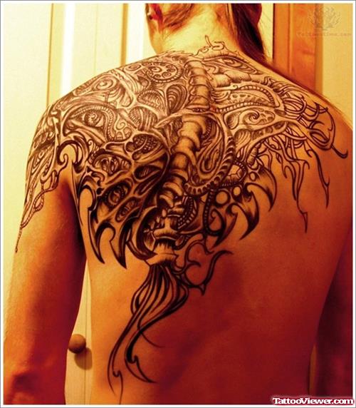 Grey Ink Biomechanical Tattoo On Back Body