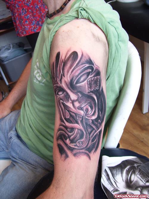 Amazing Grey Ink Biomechanical Tattoo On Left Half Sleeve