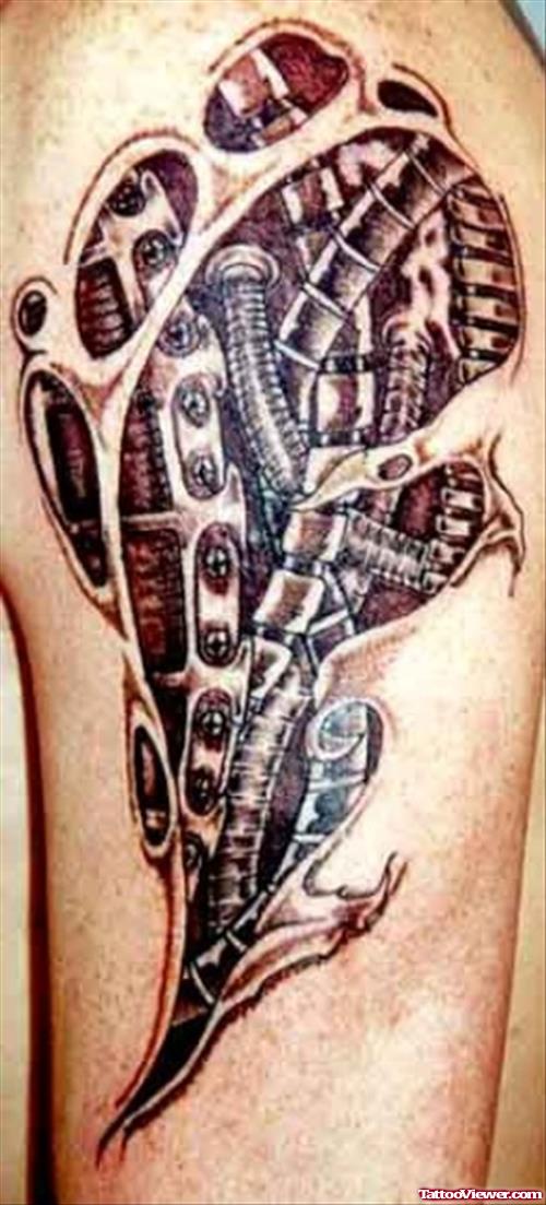 Ripped Skin Colored Biomechanical Tattoo