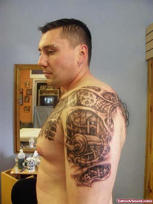 Biomechanical Grey Ink Tattoo On Shoulder