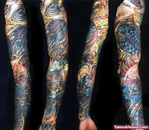Latest Colored Biomechanical Tattoo On Sleeve