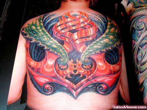 Colored Ink Biomechanical Tattoo On Man Back Body