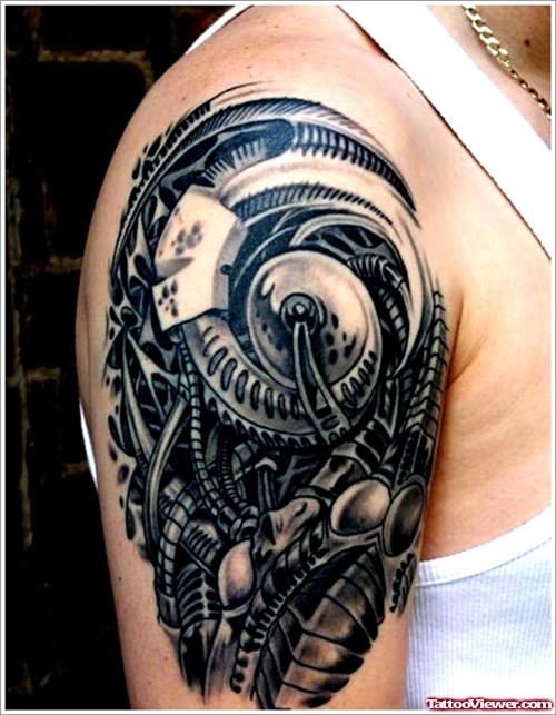 Grey Ink Biomechanical Tattoo On Man Right Shoulder