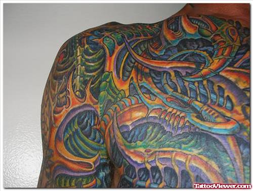 Colored Biomechanical Tattoo On Chest For Men