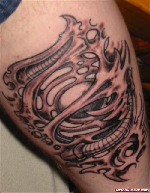 Grey Ink Tribal Biomechanical Tattoo