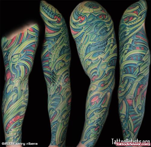 Green Ink Biomechanical Tattoo On Sleeve
