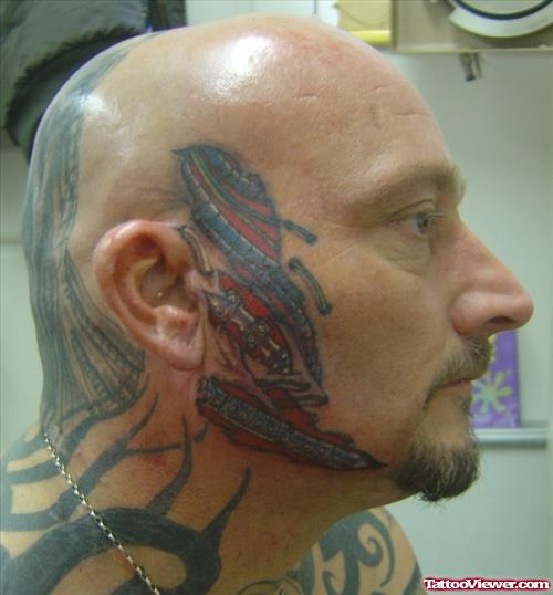 Colored Biomechanical Tattoo On Face