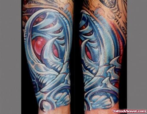 Colored Biomechanical Tattoo On Arm