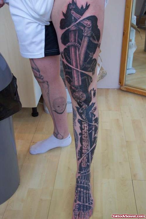 Black Ink Biomechanical Tattoo On Left Leg