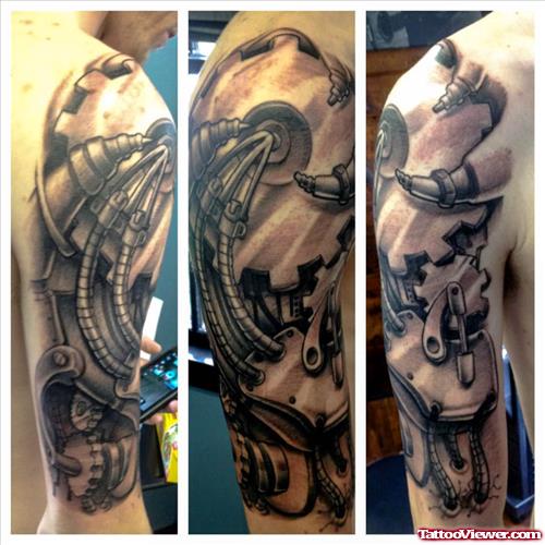 Amazing Grey Ink Biomechanical Tattoo On Half Sleeve