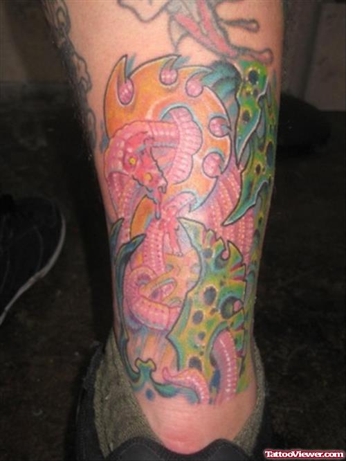 Amazing Colored Biomechanical Tattoo On Leg