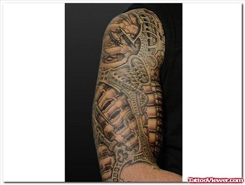 Nice Grey Ink Biomechanical Tattoo On Right Half Sleeve