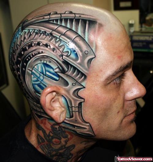 Colored Biomechanical Tattoo On Head And Face