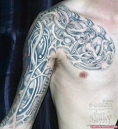 Biomechanical Tattoo On Sleeve And Chest