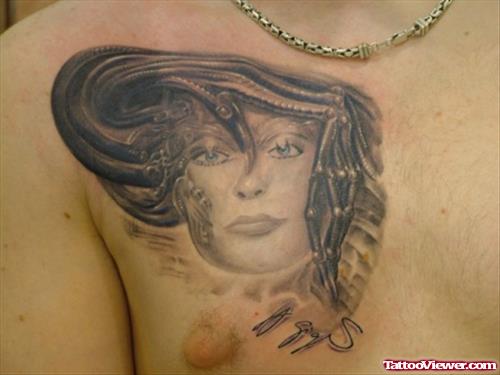 Biomechanical Girl Head Tattoo On Man Chest
