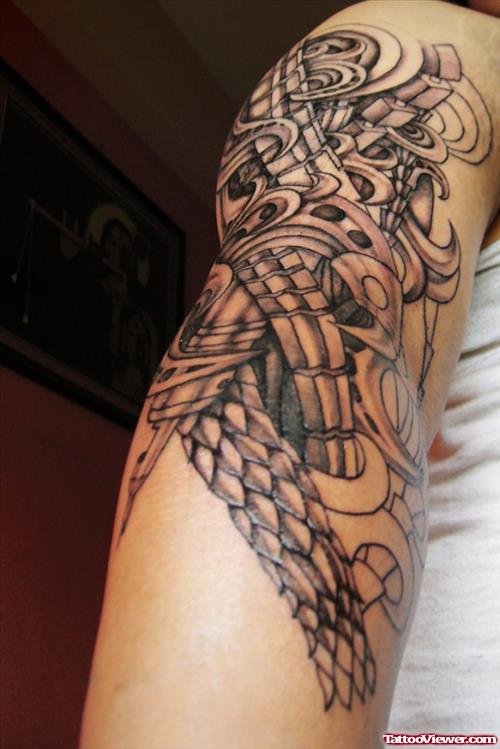 Beautiful Grey Ink Biomechanical Tattoo On Man Right Sleeve